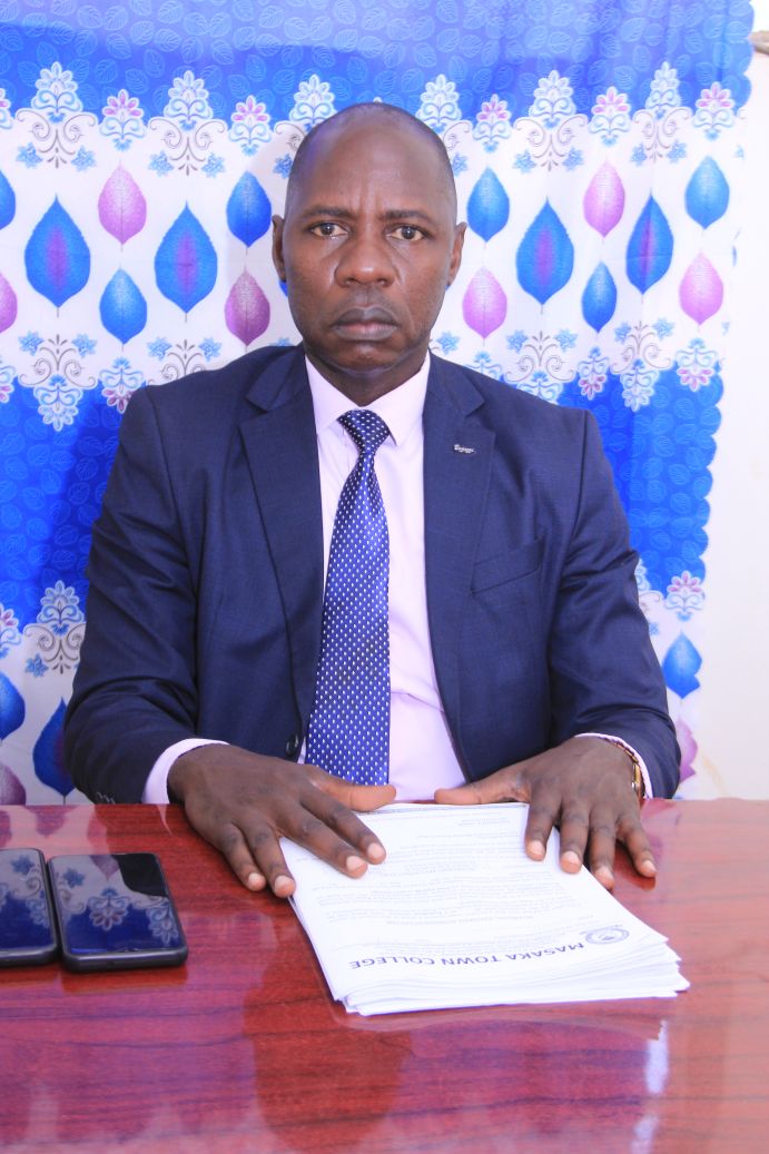 The School's Director in Office